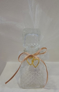 Μπομπονιέρα βάπτισης γάμου γυάλινο μπουκάλι με χρυσή καρδιά